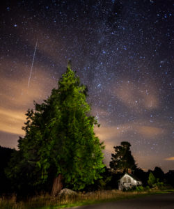 The night sky including the Milky Way and a Meteor over Glendalough, Co. Wicklow