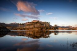 Sunset over Pine Island, Derryclare Lough in Connemara Galway